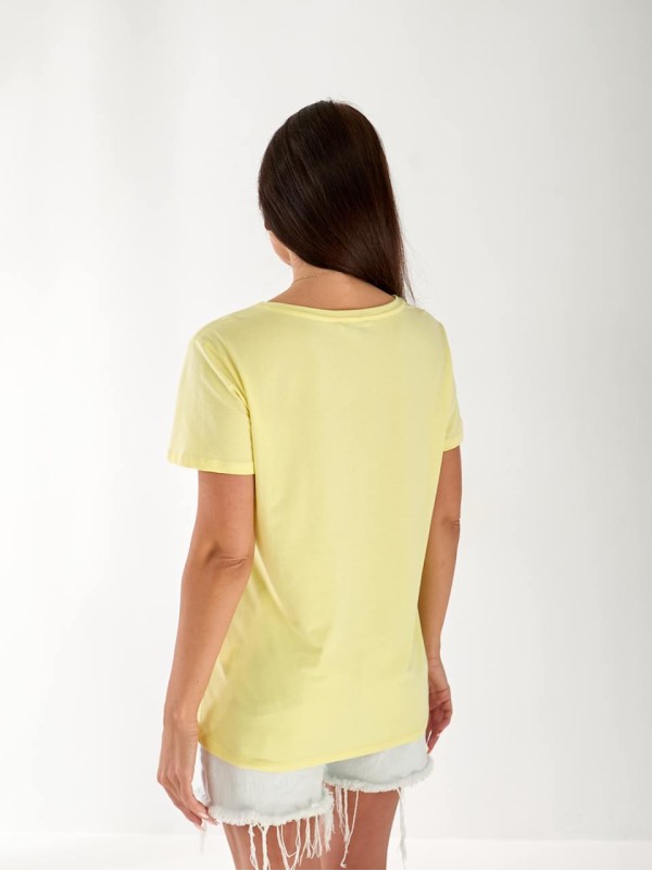 Жіноча футболка з візерунками жовтого кольору